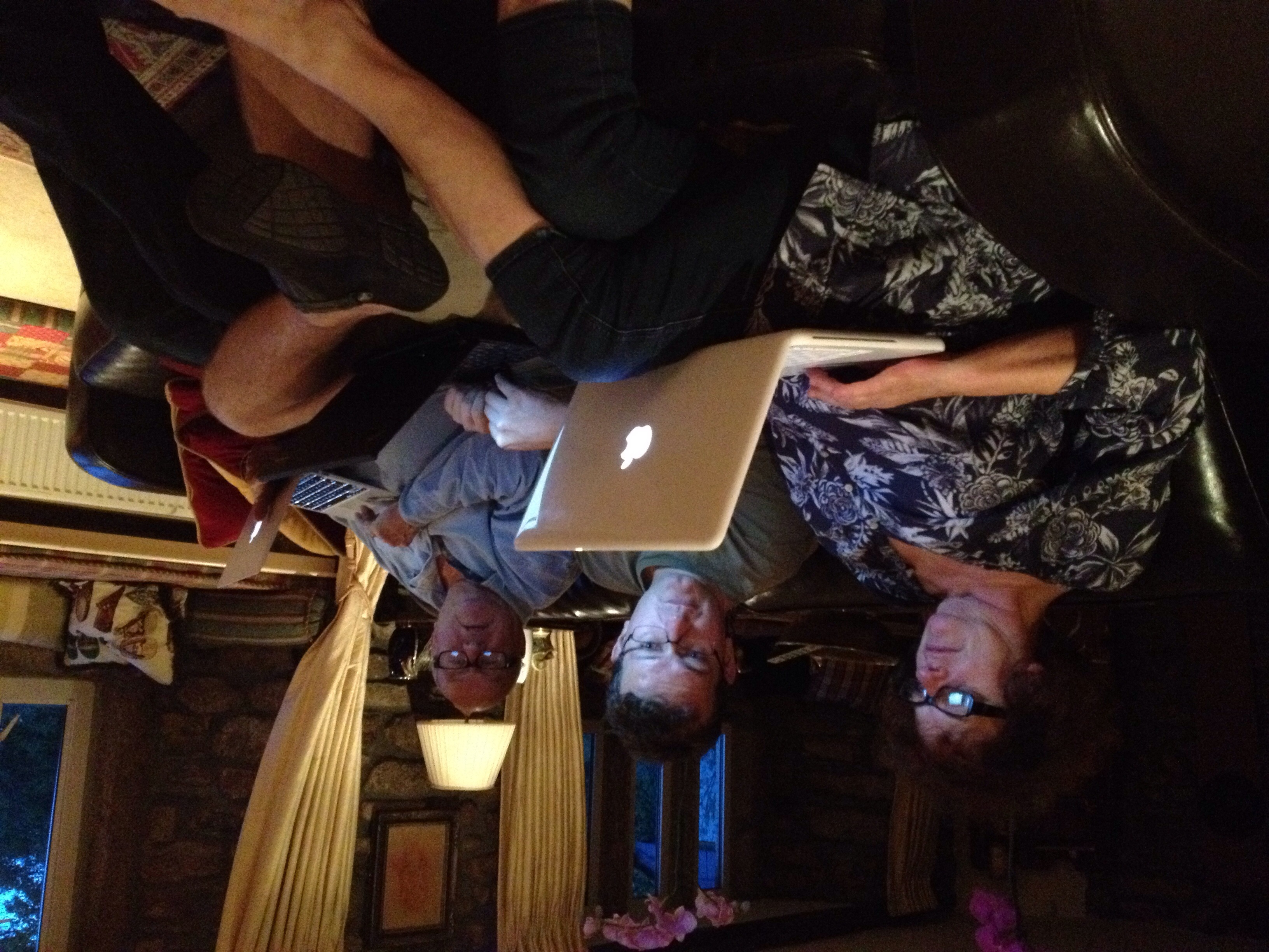 Older people using laptops together.